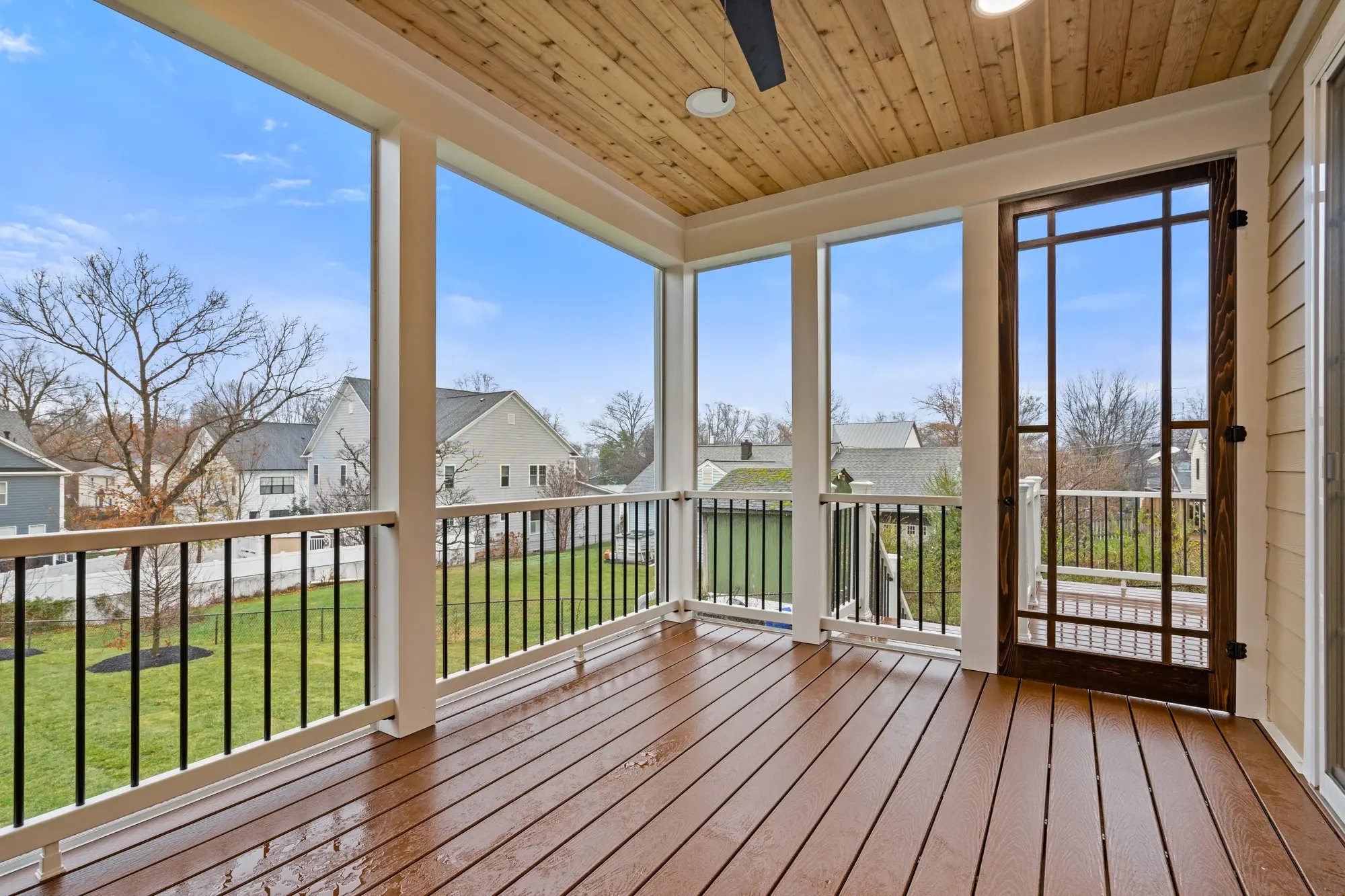 Screened-in porch with wood ceiling at Falls Church, VA renovated home